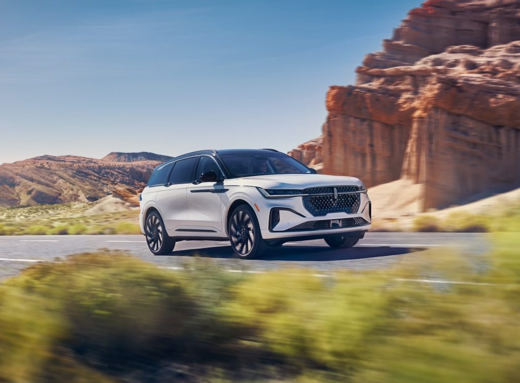 A 2026 Lincoln Nautilus SUV driving on the road.