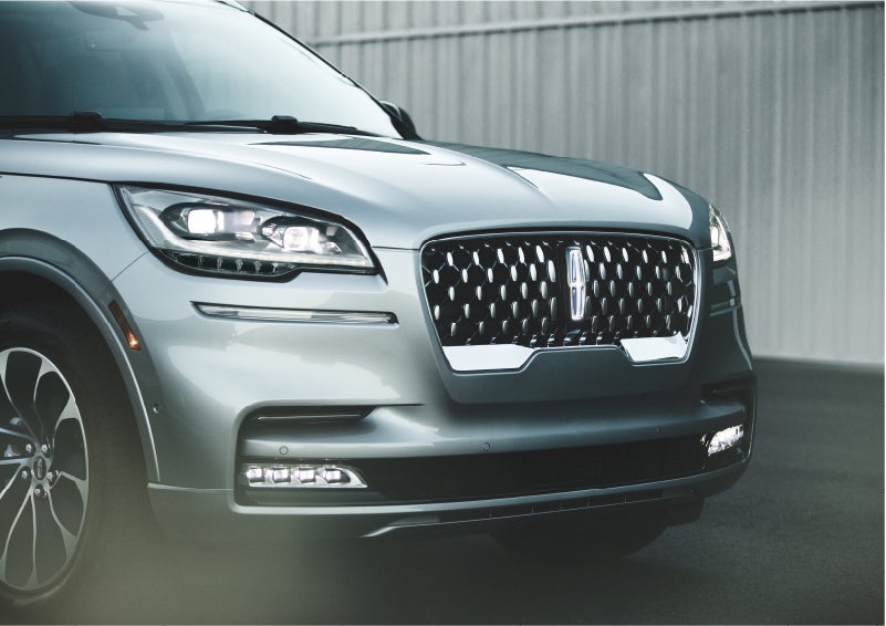The available adaptive pixel LED headlamps of the 2023 Lincoln Aviator® SUV activated | Parkway Lincoln in Winston Salem NC