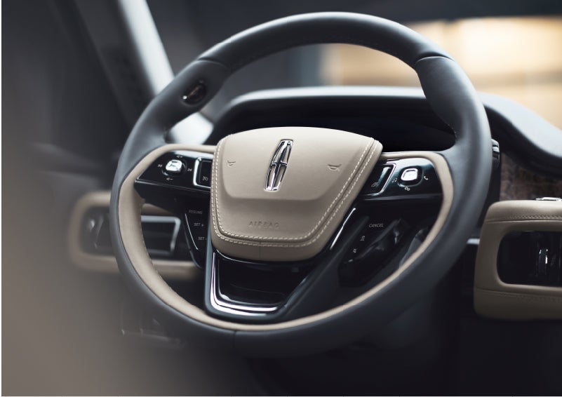 The intuitively placed controls of the steering wheel on a 2023 Lincoln Aviator® SUV | Parkway Lincoln in Winston Salem NC