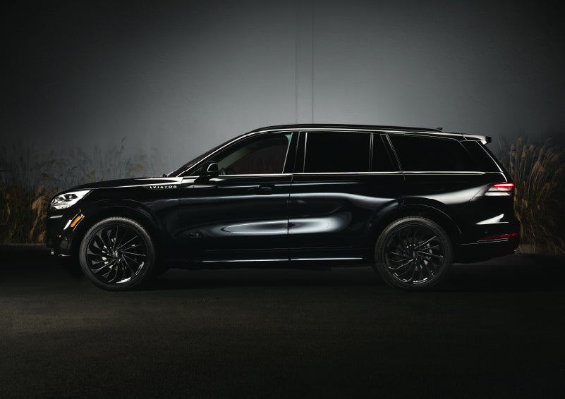 A 2024 Lincoln Aviator® SUV is shown in the Infinite Black exterior color | Parkway Lincoln in Winston Salem NC
