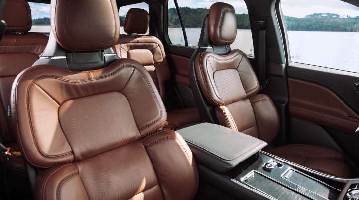 The front row's Perfect Position Seats in a 2024 Lincoln Aviator® Reserve model with Ebony Roast interior | Parkway Lincoln in Winston Salem NC