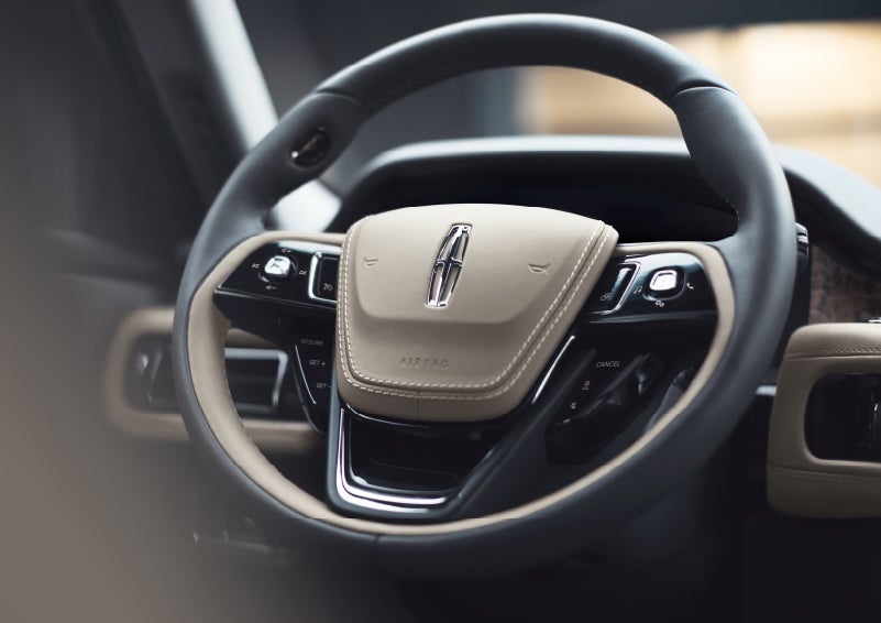 The intuitively placed controls of the steering wheel on a 2024 Lincoln Aviator® SUV | Parkway Lincoln in Winston Salem NC