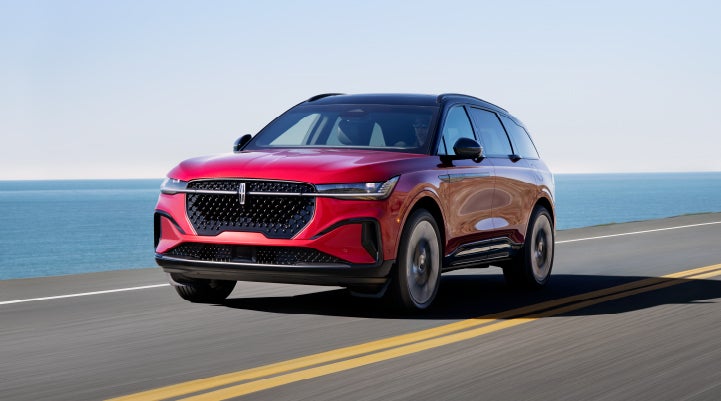 A 2024 Lincoln Nautilus® SUV is being driven on a seaside roadway. | Parkway Lincoln in Winston Salem NC