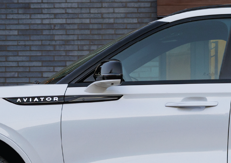 The driver’s door of a white 2025 Lincoln Aviator® SUV is showcased. | Parkway Lincoln in Winston Salem NC