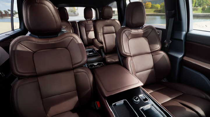 The cabin of the 2025 Lincoln Aviator® SUV is shown with black and brown accents. | Parkway Lincoln in Winston Salem NC