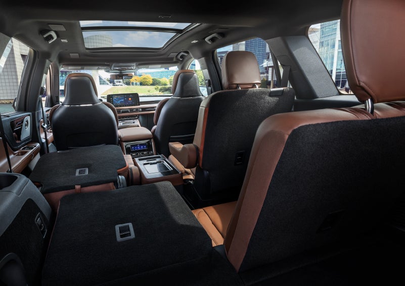 The interior of the 2025 Lincoln Aviator® SUV is shown with two seats folded down for added space. | Parkway Lincoln in Winston Salem NC