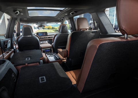 The interior of the 2025 Lincoln Aviator® SUV is shown with two seats folded down for added space. | Parkway Lincoln in Winston Salem NC