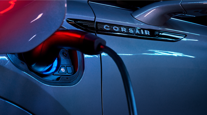 A charger plugged into the charging port of a 2025 Lincoln Corsair® Plug-in Hybrid model. | Parkway Lincoln in Winston Salem NC