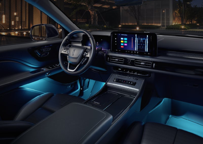 Deep blue ambient lighting glows from various places within a 2026 Lincoln Aviator® SUV. | Parkway Lincoln in Winston Salem NC