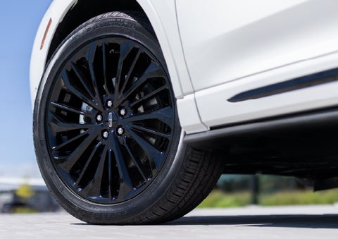 A stylish 20-inch black aluminum wheel of the available Jet Appearance Package is shown. | Parkway Lincoln in Winston Salem NC