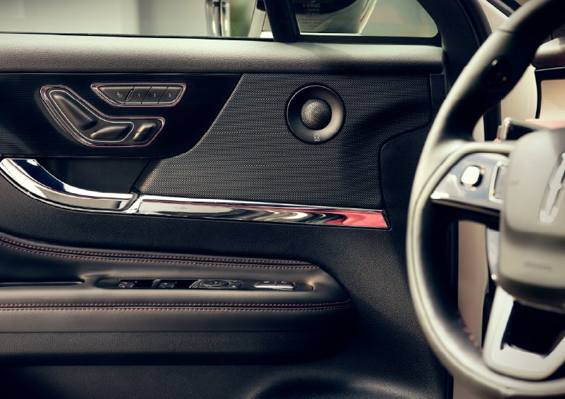 An audio speaker is shown in the driver's side door of a 2026 Lincoln Corsair® SUV | Parkway Lincoln in Winston Salem NC