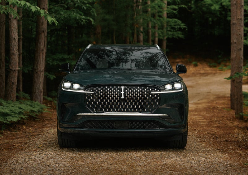 The front grille of a 2027 Lincoln Aviator® Black Label™ SUV is shown. | Parkway Lincoln in Winston Salem NC