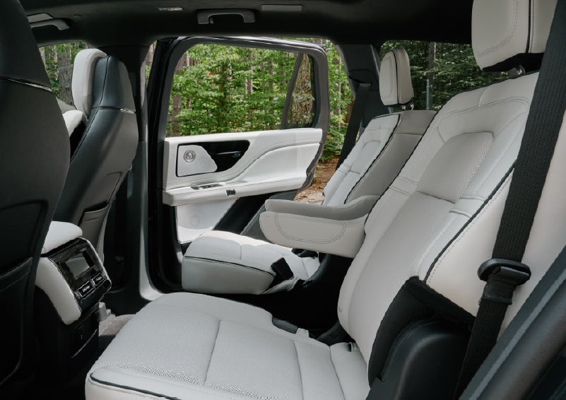 A side view of the second row with captain’s chairs in a 2027 Lincoln Aviator® Black Label™ SUV. | Parkway Lincoln in Winston Salem NC